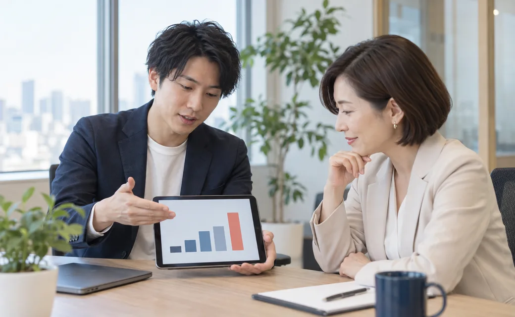訓練の結果を上司に説明する担当者